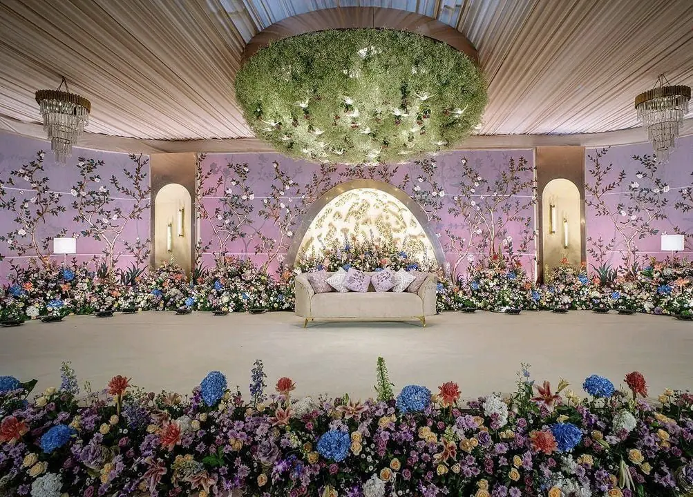 Floral mandap and stage décor at a wedding