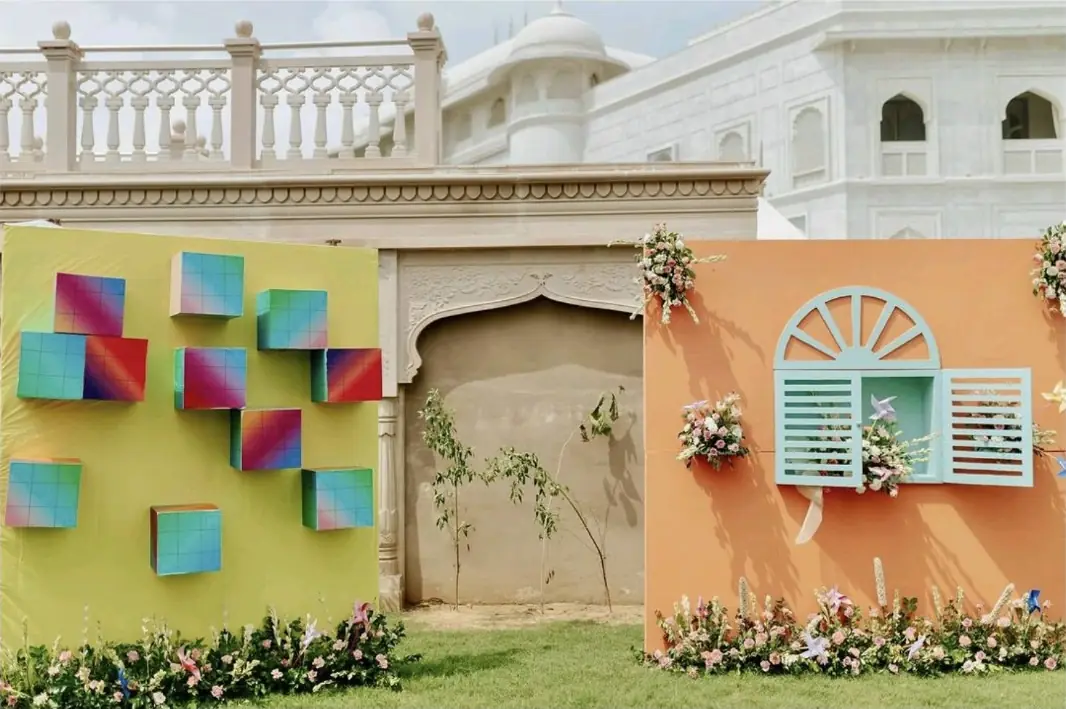 Outdoor décor build with painted panels and floral dressing