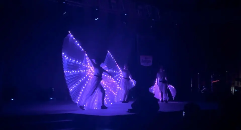 LED wing performance on a darkened stage